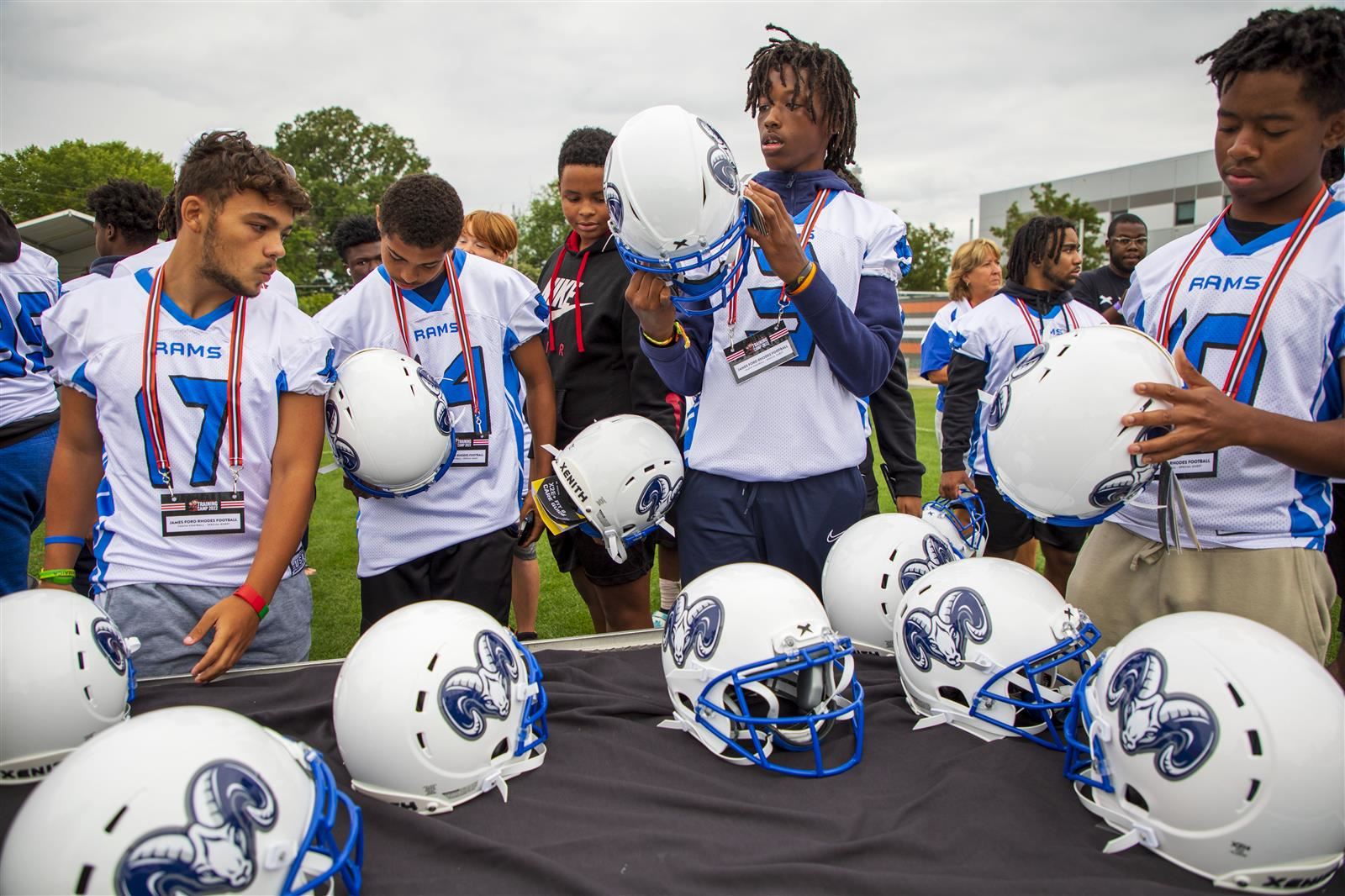  Browns present new helmets to Rhodes football team (Video)